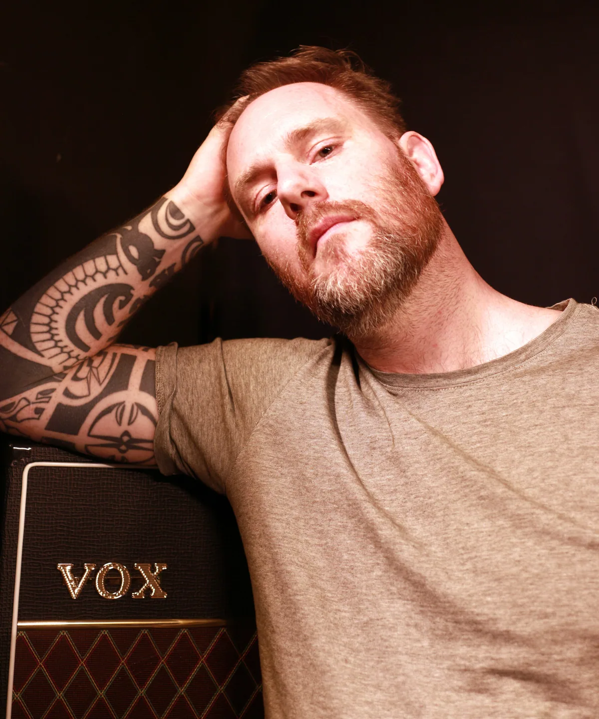 Fredrik Boqvist with a guitar amplifier